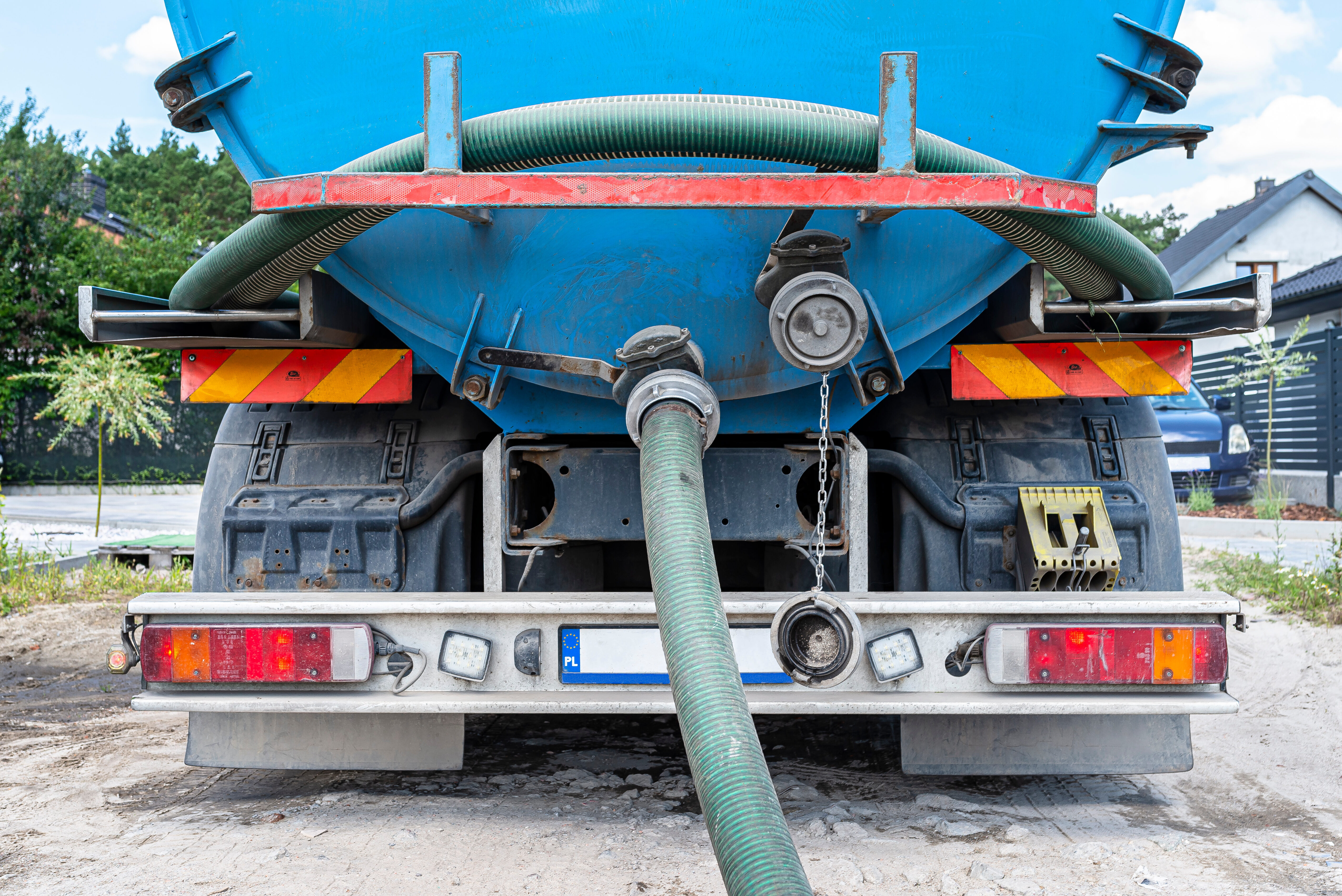 Back of a tanker shipping out waste